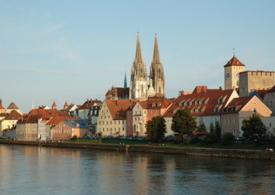 View at Regensburg cathedral with Danube river in foreground